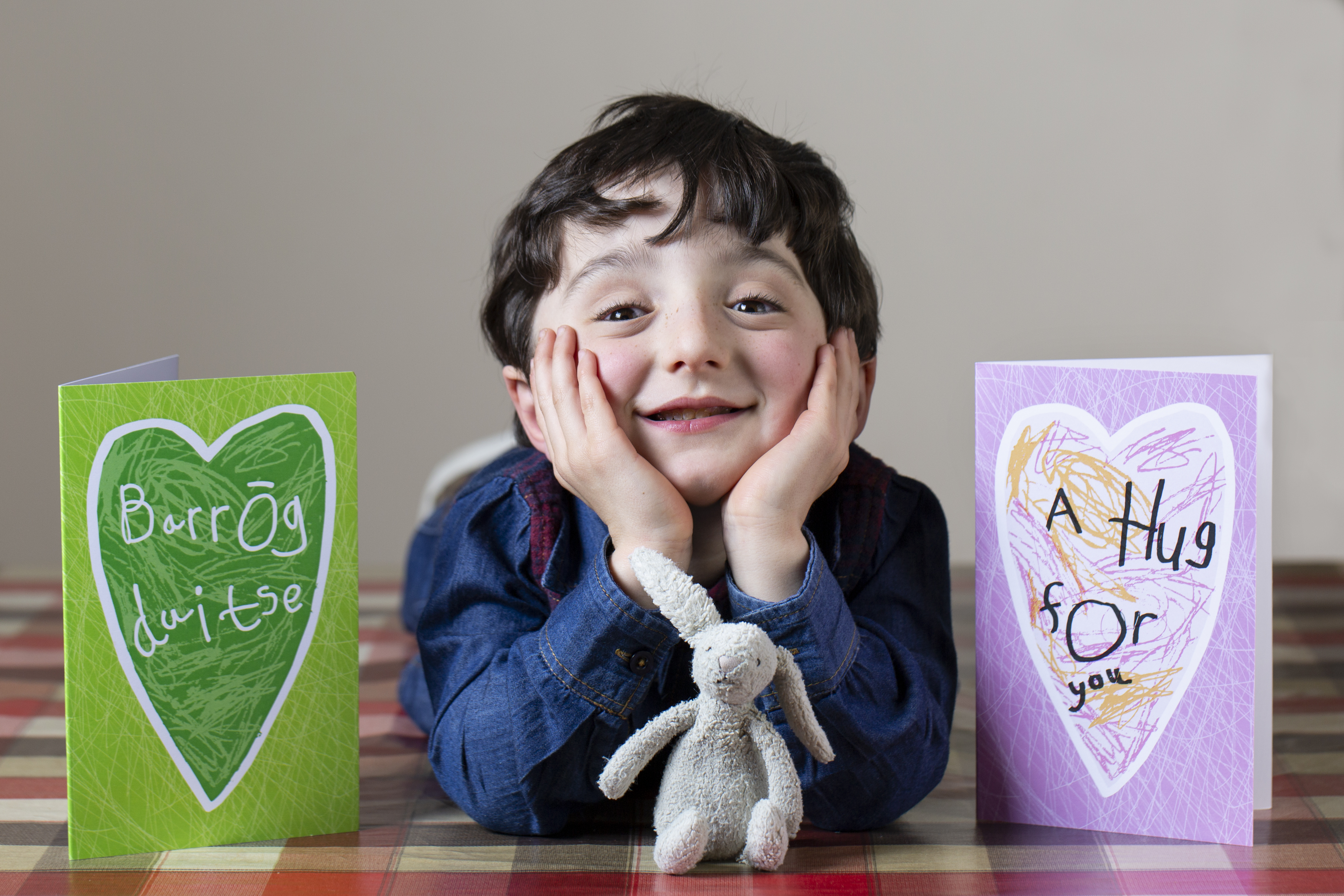 Adam King pictured with his Virtual Hug and Barróg duitse cards